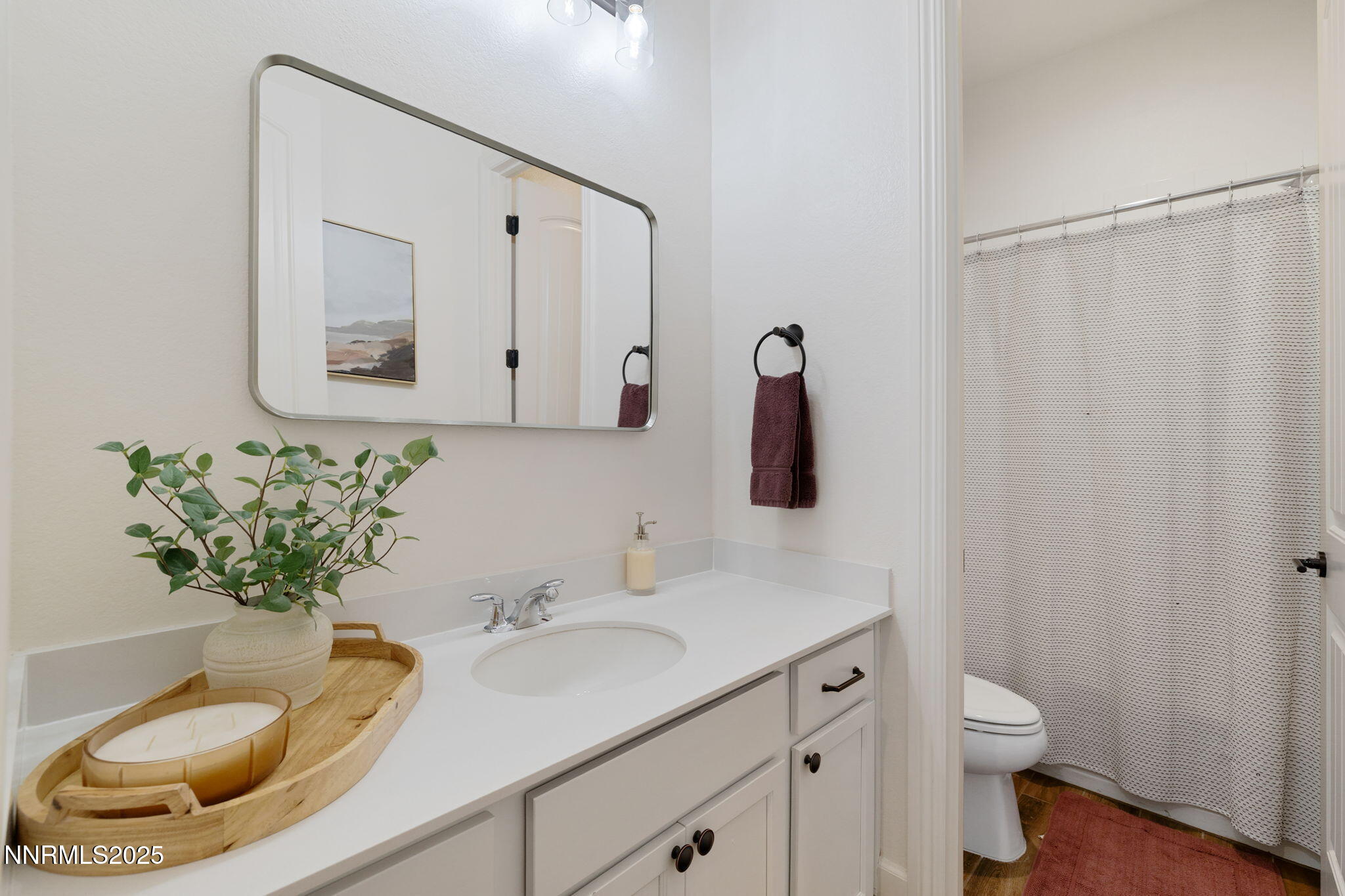3011 Silverberry Lane Reno, NV 89521 - Photo 14 of 25 a bathroom with a granite countertop sink and a mirror