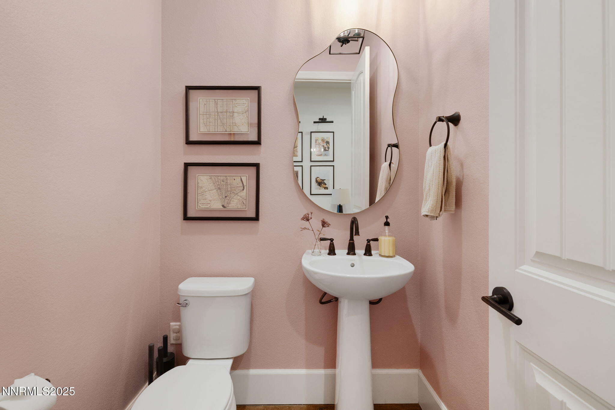 3011 Silverberry Lane Reno, NV 89521 - Photo 16 of 25 a bathroom with a toilet sink and mirror