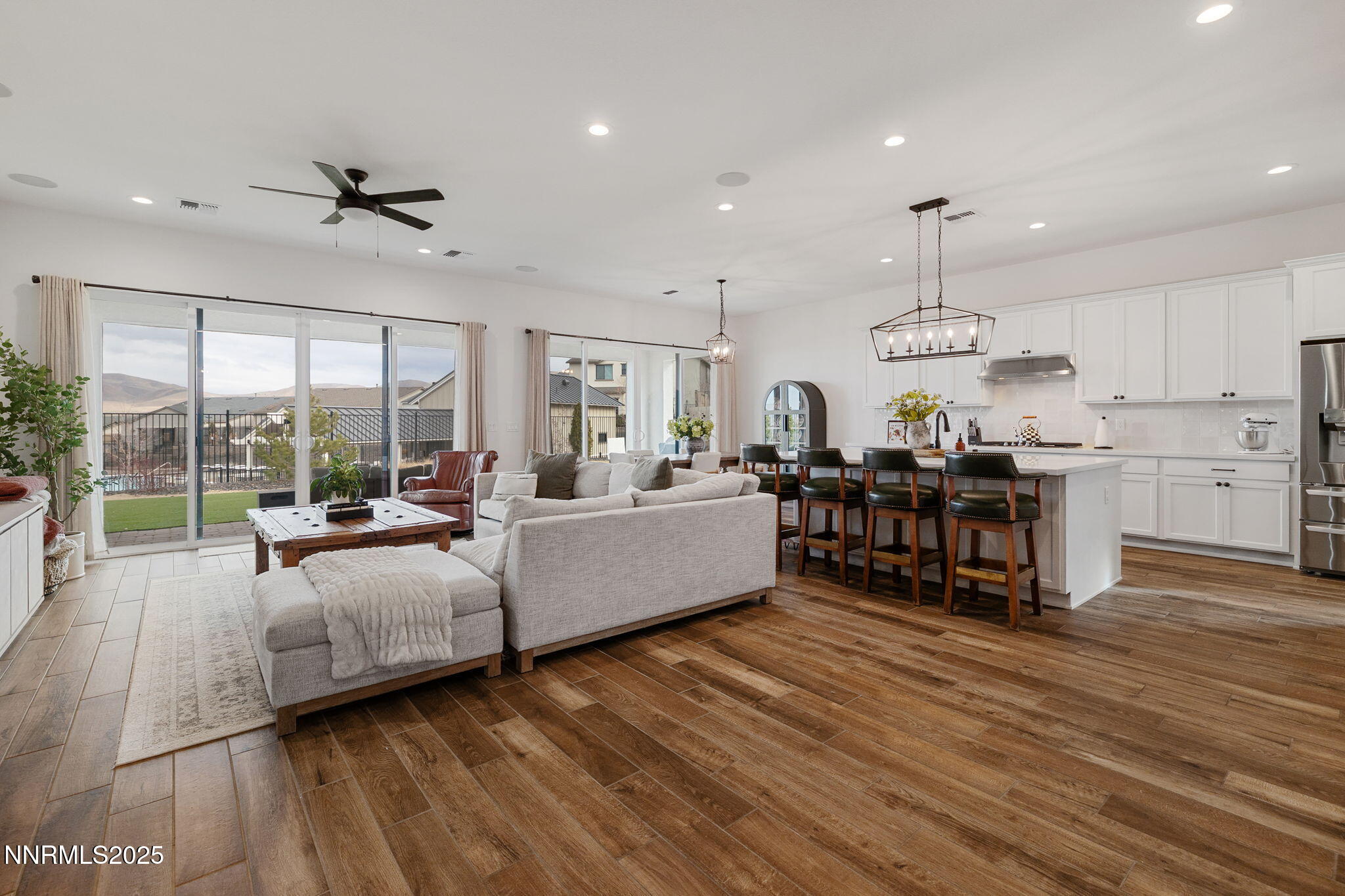 3011 Silverberry Lane Reno, NV 89521 - Photo 3 of 25 a living room with furniture and a large window