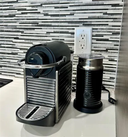a close view of shoes and a stove