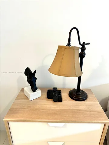 a bathroom with a shower and a window