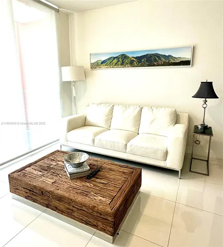 a living room with a couch and a coffee table