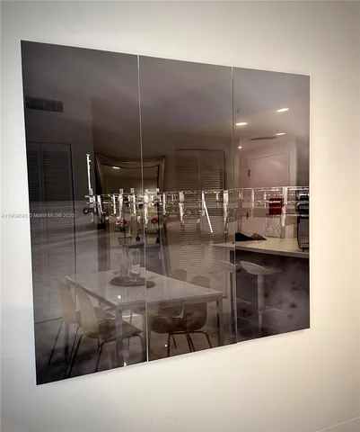 a view of a lobby with black carpet