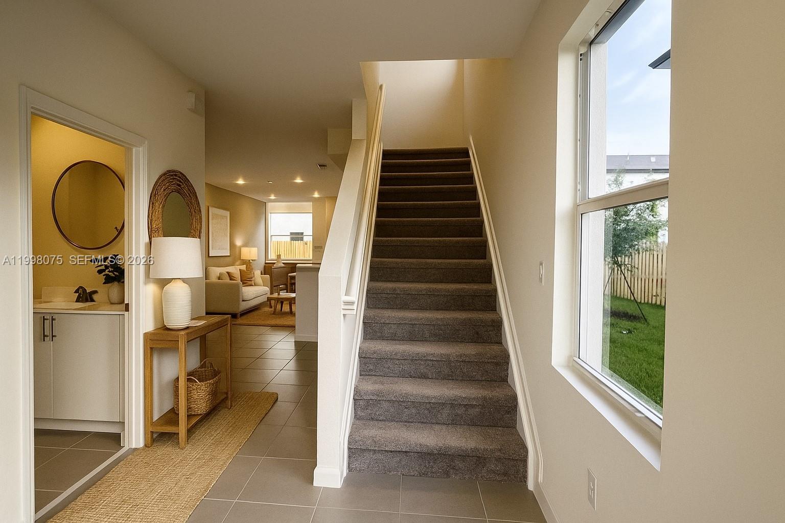 15583 Southwest 277th Street, Unit 15583 Homestead, FL 33032 - Photo 3 of 27 a view of entryway and hall with wooden floor