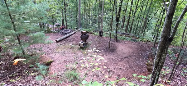 a backyard of a house with lots of green space