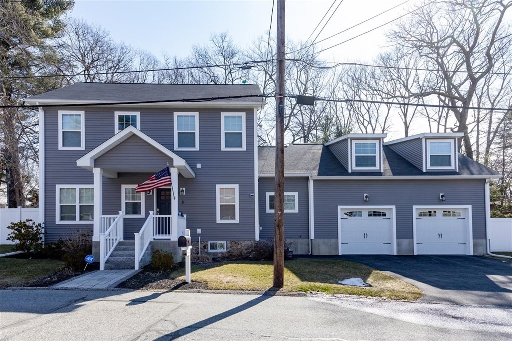 6 Harnden Road Billerica, MA 01821 - Photo 3 of 42 a front view of a house with garden