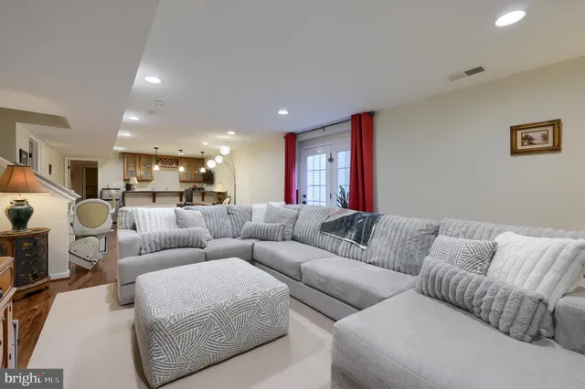 a living room with furniture and a couch