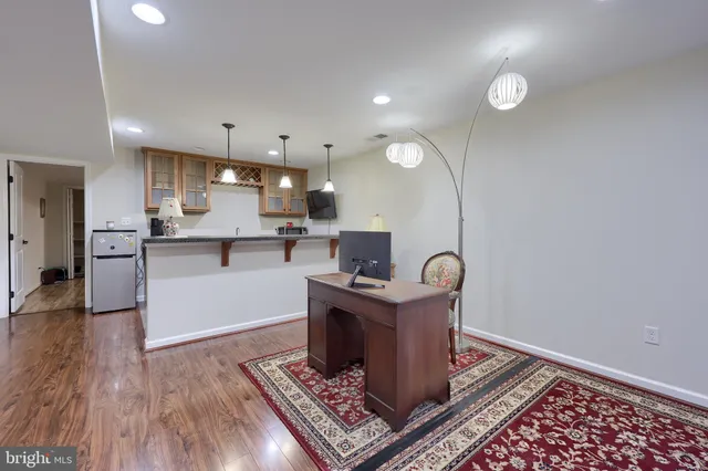 a living room with furniture and a table