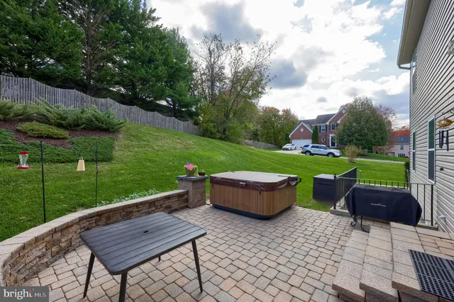 a view of a chairs and table in the garden