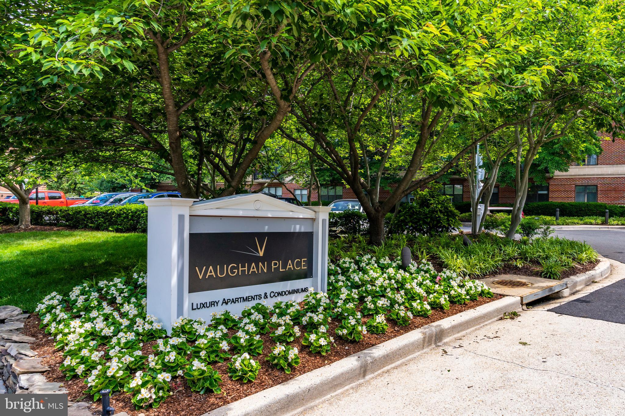3401 38th Street Northwest, Unit 407 Washington, DC 20016 - Photo 2 of 37 a sign board with a small yard