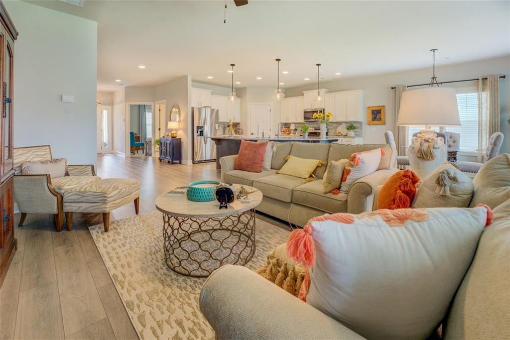 616 Haven Way Monroe, GA 30655 - Photo 16 of 40 a living room with furniture and a table