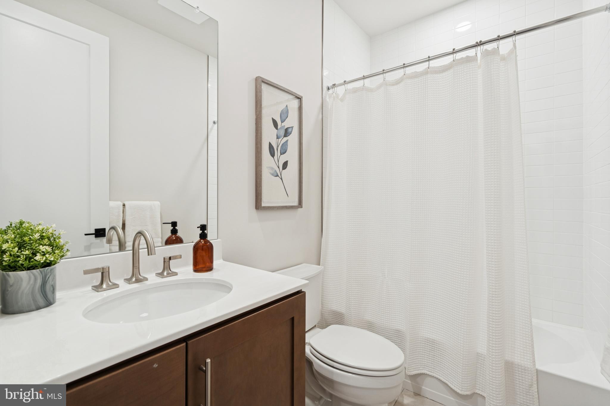 321 Gilman Street Malvern, PA 19355 - Photo 22 of 25 a bathroom with a sink toilet and vanity