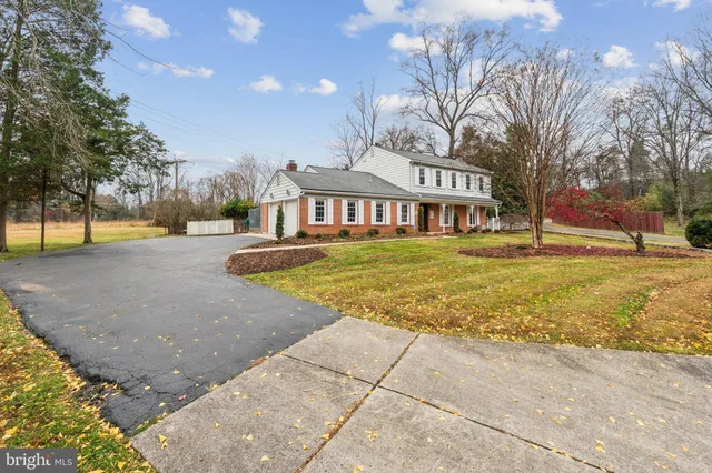a view of swimming pool with an outdoor space and seating area