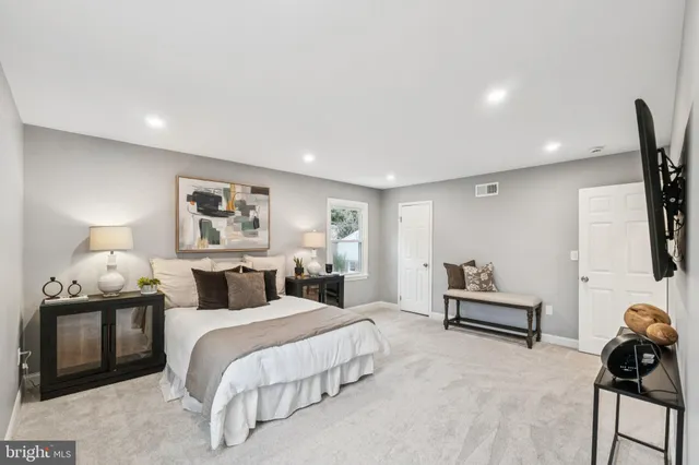 a bathroom with a shower and a sink