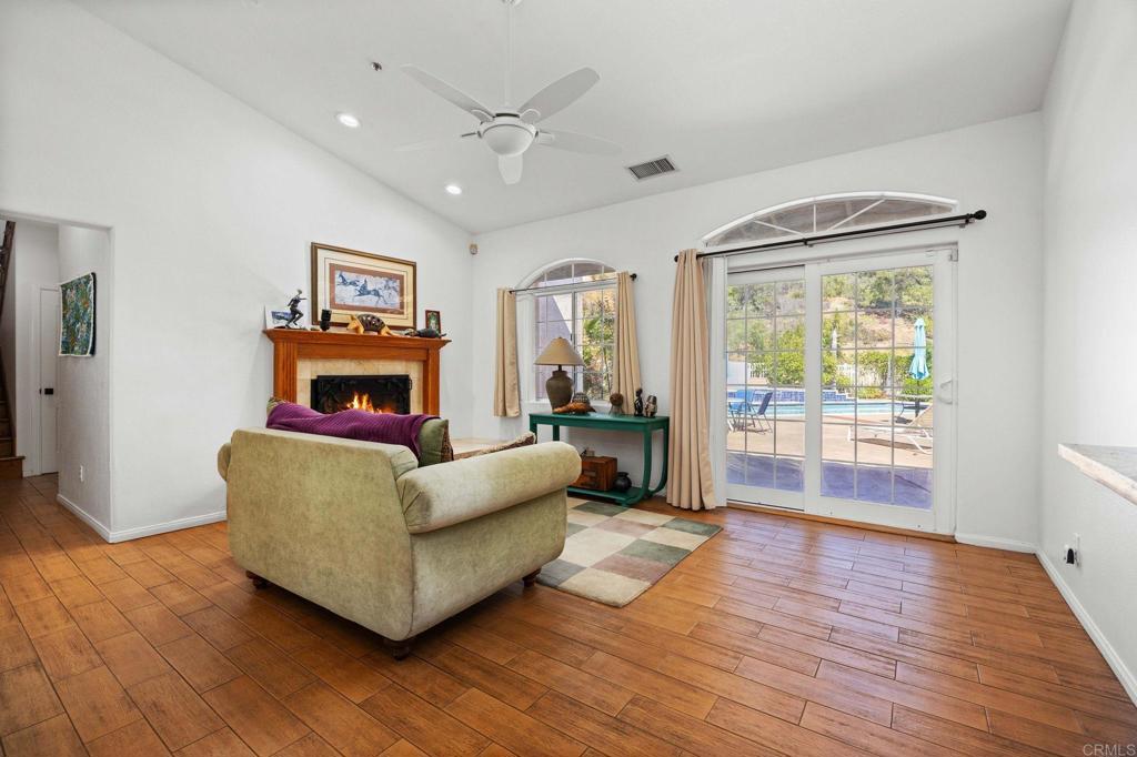 7635 Little Creek Road San Marcos, CA 92078 - Photo 14 of 48 a living room with furniture and a fireplace