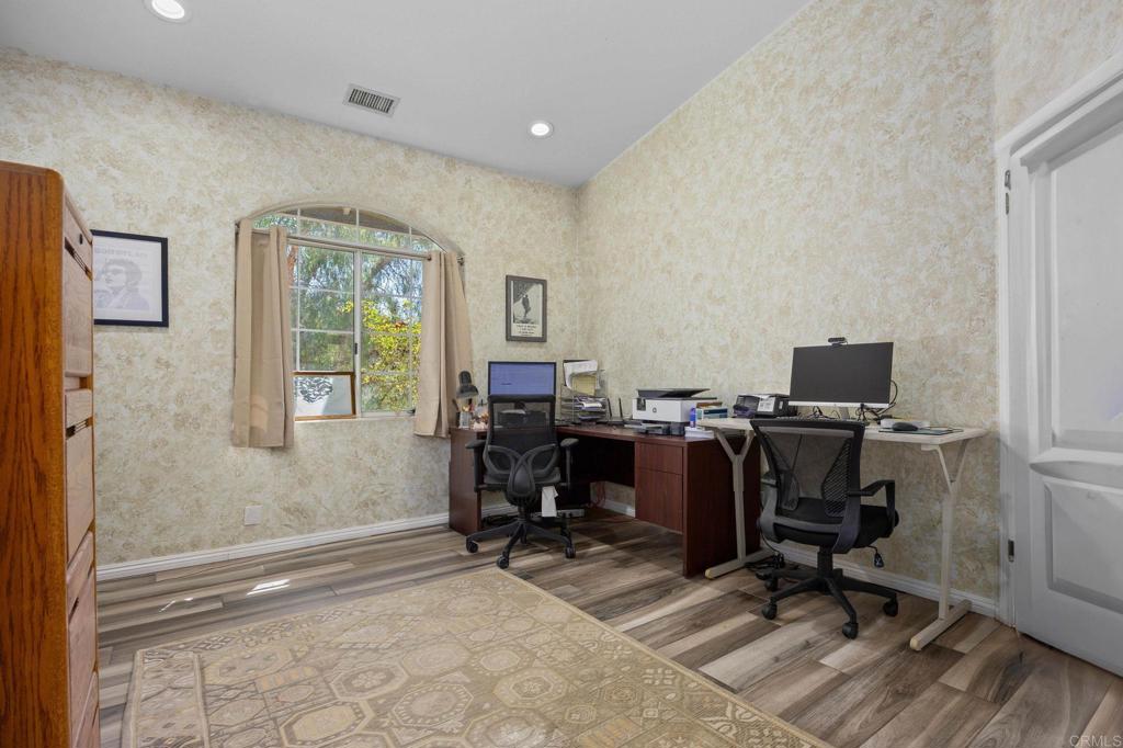 7635 Little Creek Road San Marcos, CA 92078 - Photo 17 of 48 a view of workspace with wooden floor windows