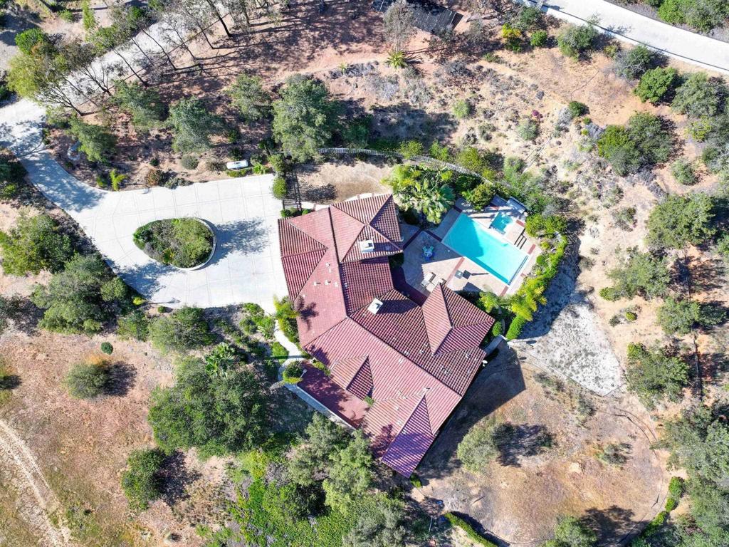 7635 Little Creek Road San Marcos, CA 92078 - Photo 2 of 48 an aerial view of a house with a yard