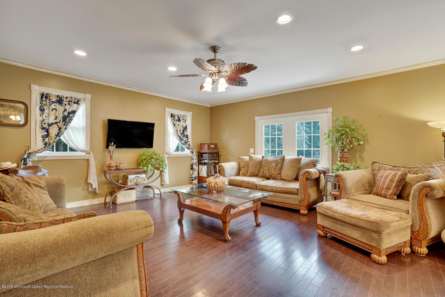 49 Evergreen Drive Jackson, NJ 08527 - Photo 15 of 50 a living room with furniture and a flat screen tv