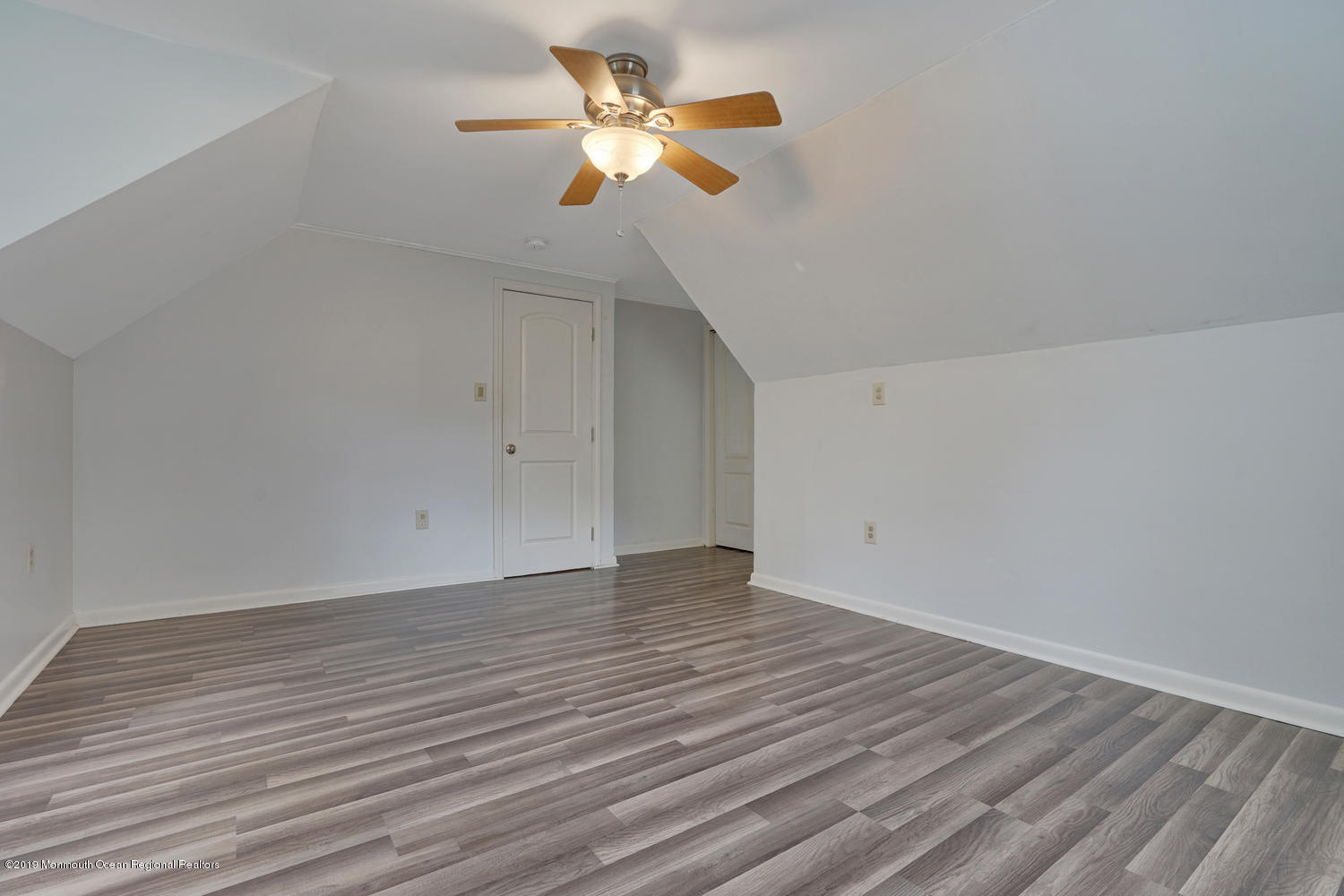 49 Evergreen Drive Jackson, NJ 08527 - Photo 22 of 50 wooden floor in an empty room with a window