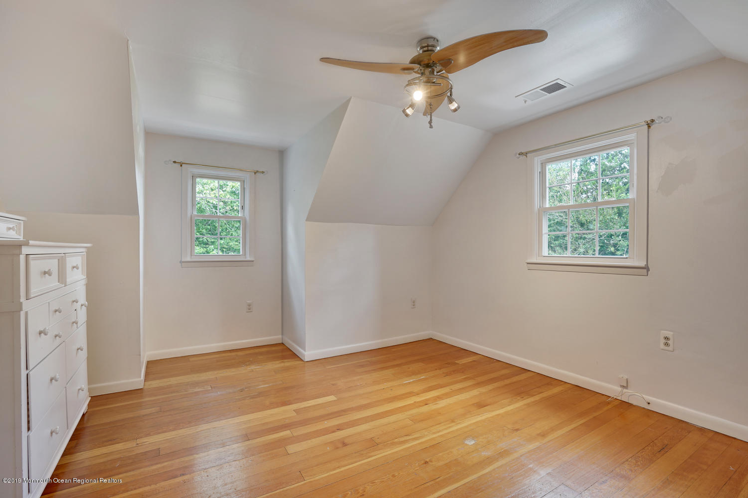 49 Evergreen Drive Jackson, NJ 08527 - Photo 23 of 50 wooden floor in an empty room with a window
