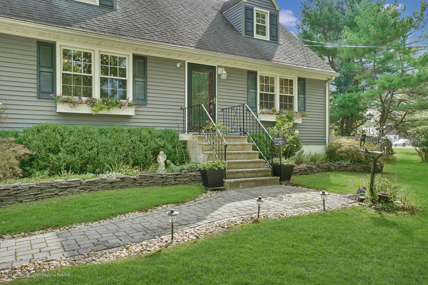 49 Evergreen Drive Jackson, NJ 08527 - Photo 30 of 50 a view of a house with a yard and a garden