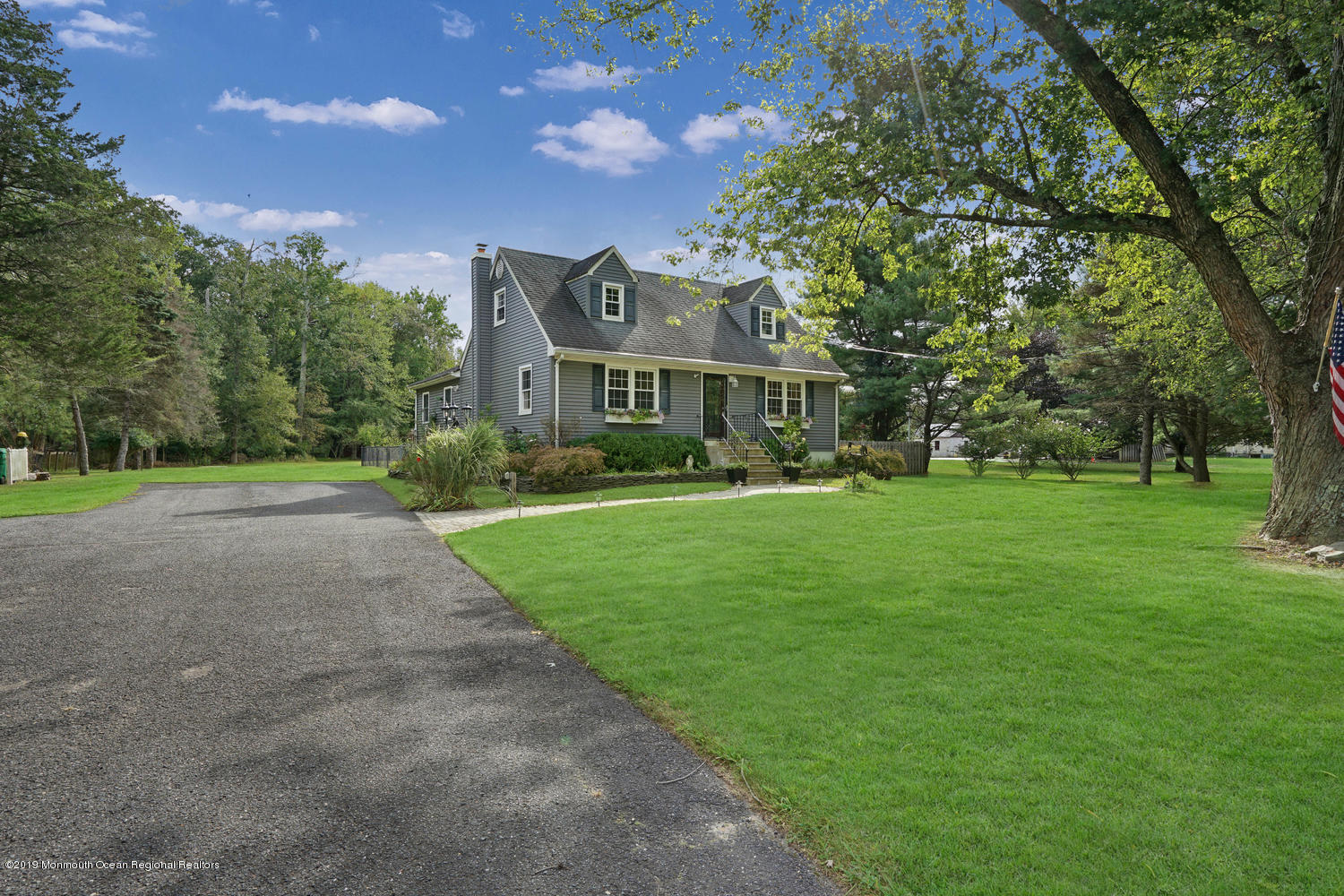 49 Evergreen Drive Jackson, NJ 08527 - Photo 31 of 50 a front view of house with yard and green space