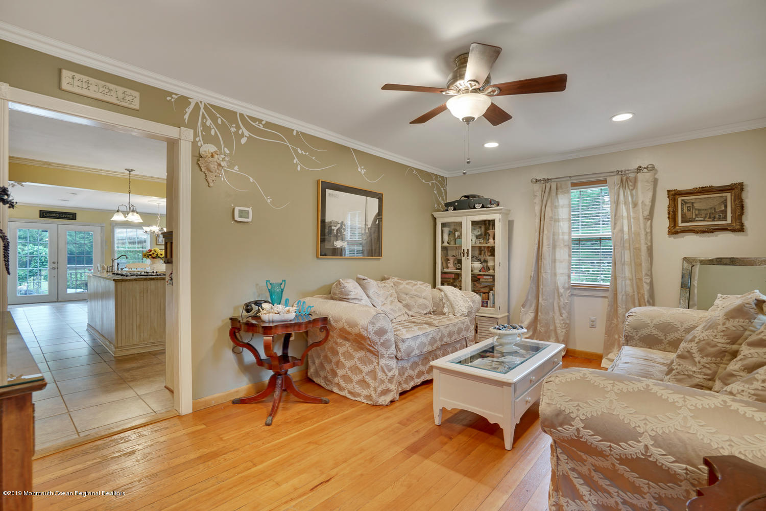49 Evergreen Drive Jackson, NJ 08527 - Photo 4 of 50 a living room with furniture and a chandelier