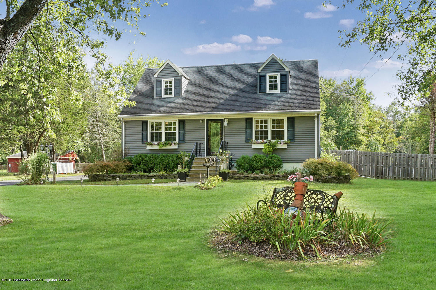 49 Evergreen Drive Jackson, NJ 08527 - Photo 44 of 50 a front view of house with yard and green space