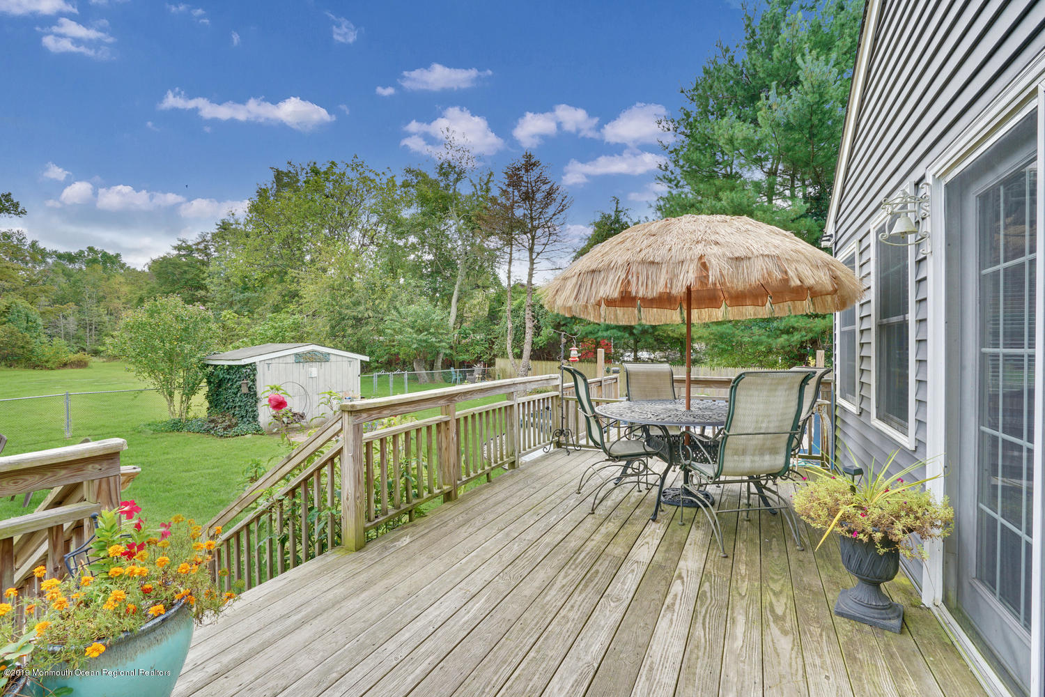 49 Evergreen Drive Jackson, NJ 08527 - Photo 45 of 50 a view of deck with furniture and barbeque oven