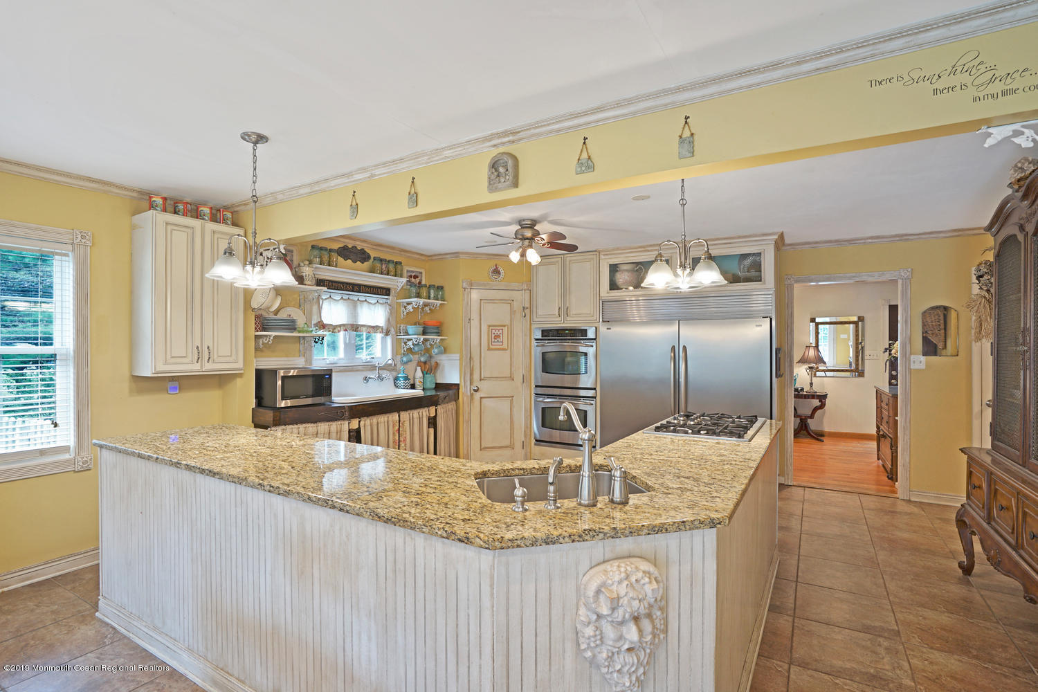 49 Evergreen Drive Jackson, NJ 08527 - Photo 10 of 50 a kitchen with stainless steel appliances granite countertop a sink and a refrigerator