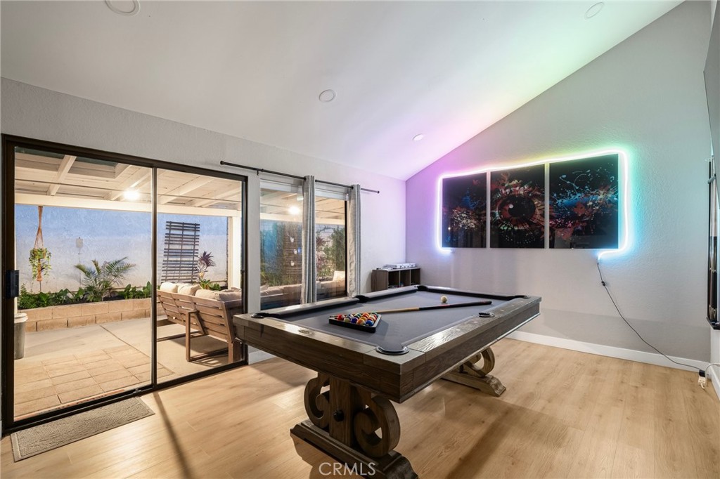 1128 Dawn Ridge Way Covina, CA 91724 - Photo 11 of 32 a living room with projector and a table