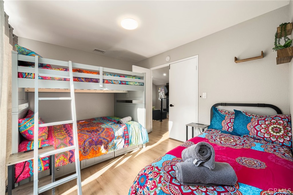 1128 Dawn Ridge Way Covina, CA 91724 - Photo 21 of 32 a bedroom with bed and a bed