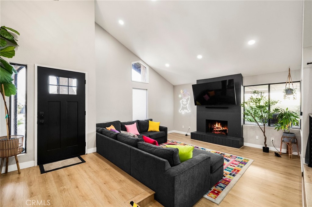 1128 Dawn Ridge Way Covina, CA 91724 - Photo 4 of 32 a living room with furniture and a fireplace