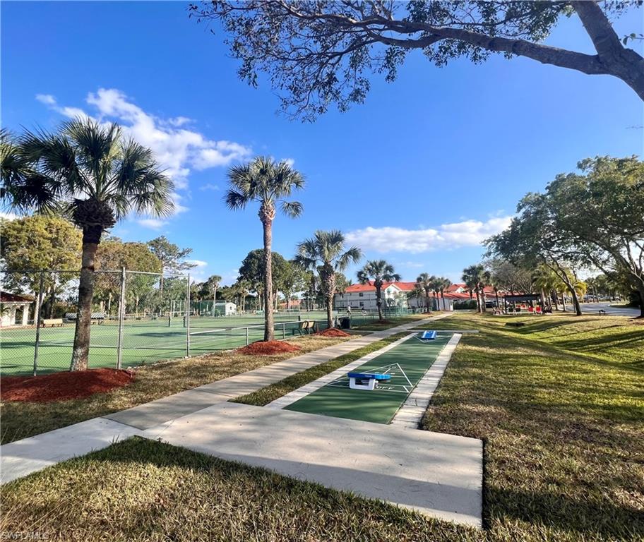 409 Gabriel Circle, Unit 2203 Naples, FL 34104 - Photo 18 of 18 a view of a basketball court
