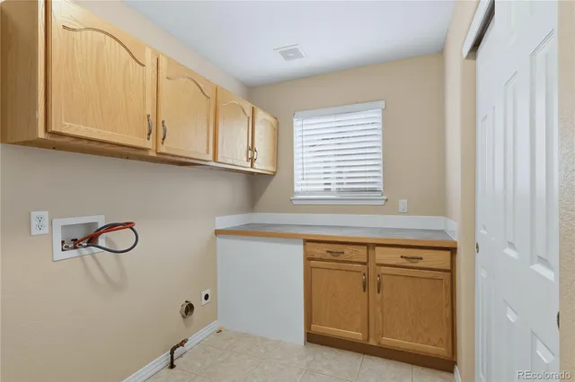 a bathroom with a granite countertop sink toilet a mirror and shower