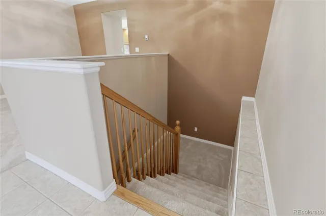 a bathroom with a double vanity sink mirror and shower