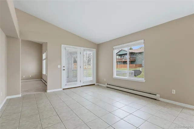 an empty room with windows