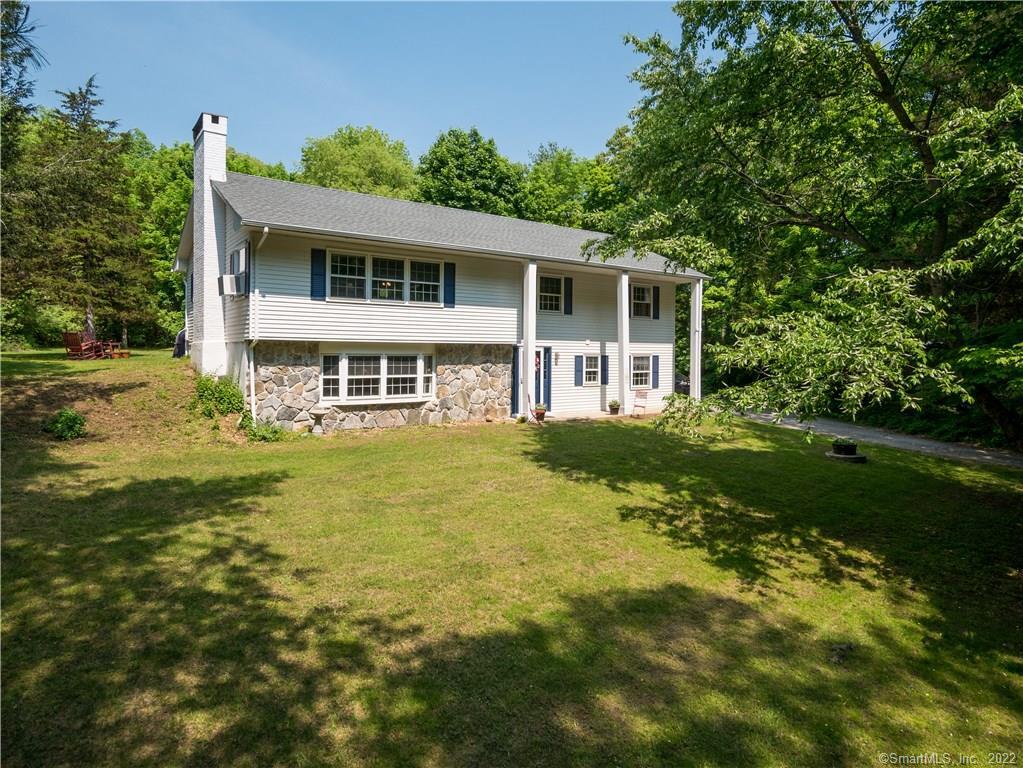 33 Chaffeeville Road Mansfield, CT 06250 - Photo 1 of 1 a house view with a garden space