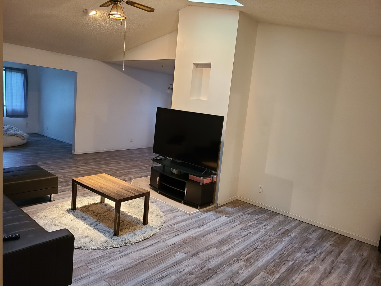2001 Eagle Ridge Court, Unit A Urbana, IL 61802 - Photo 3 of 30 a living room with furniture and a flat screen tv