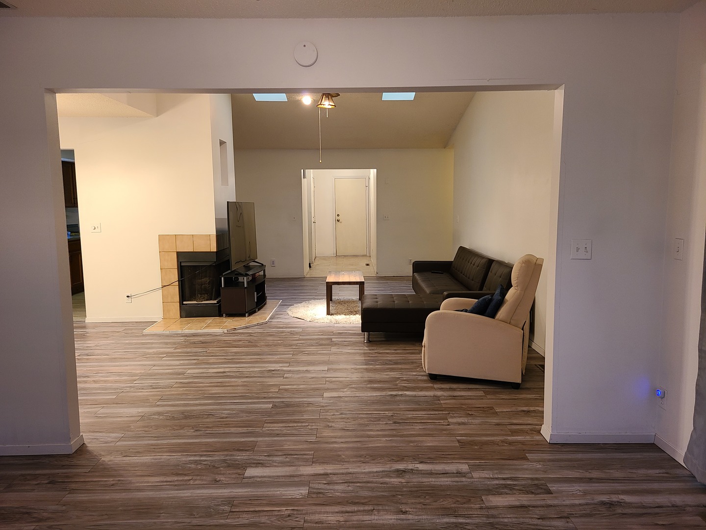 2001 Eagle Ridge Court, Unit A Urbana, IL 61802 - Photo 9 of 30 a living room with furniture and a fireplace