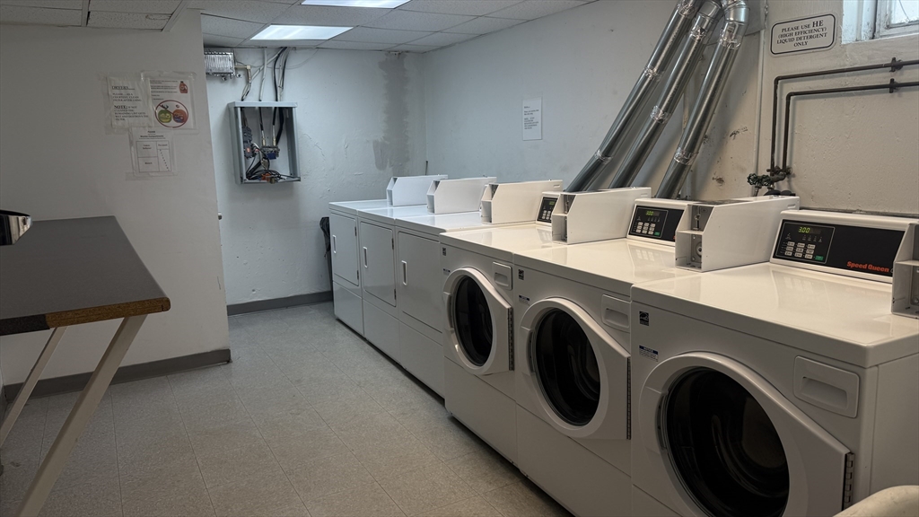 100 Marion Street, Unit B Brookline, MA 02446 - Photo 8 of 9 a utility room with dryer and washer