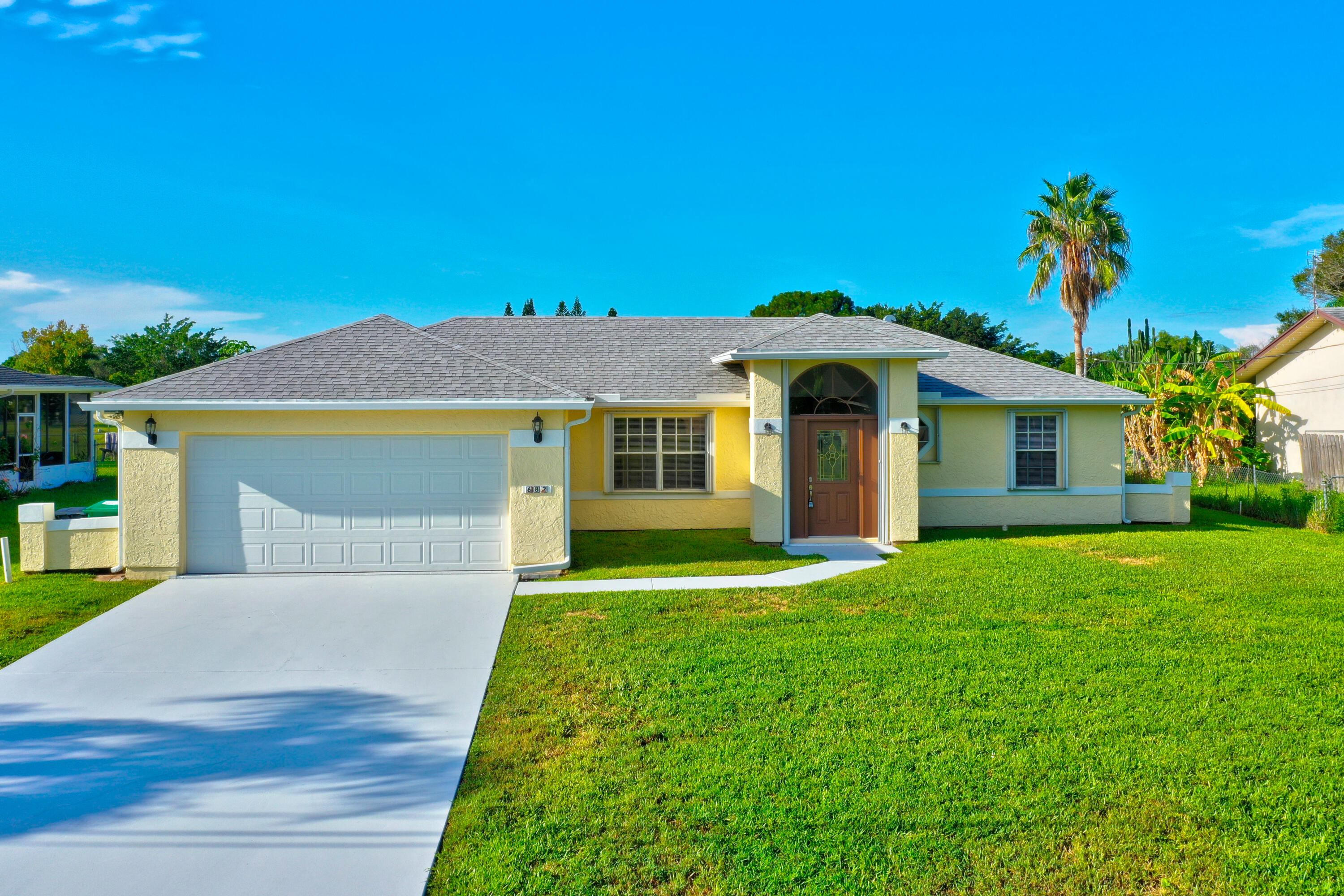 682 Southwest College Park Road Port St. Lucie, FL 34953 - Photo 1 of 40 35_dji_0697_698_699_700_701