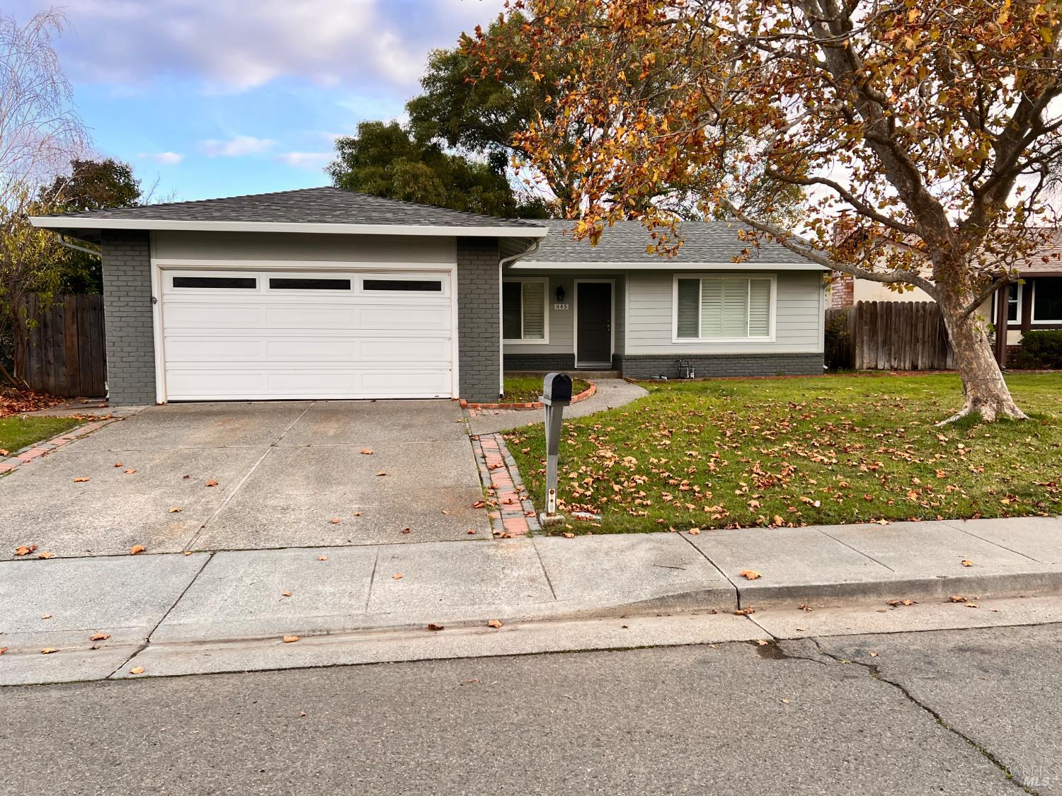 front view of a house with a pathway