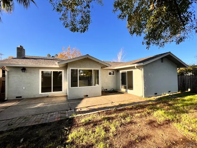 a view of a house with a patio