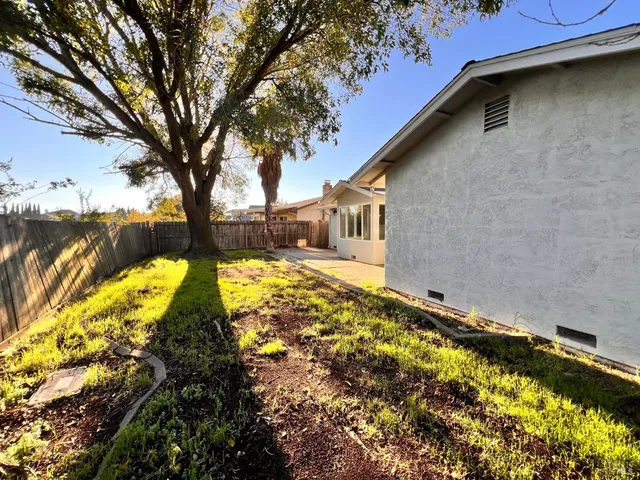 a view of swimming pool with a yard