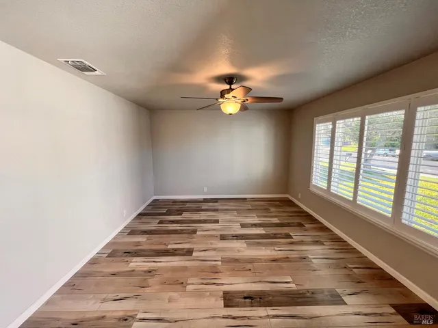 a view of an empty room and window