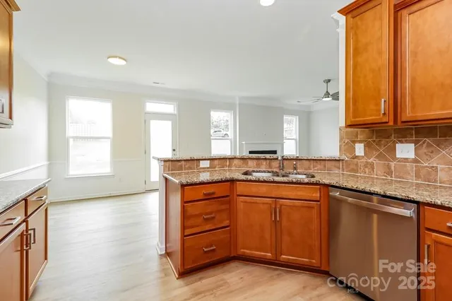 a large bathroom with a granite countertop sink and a large mirror