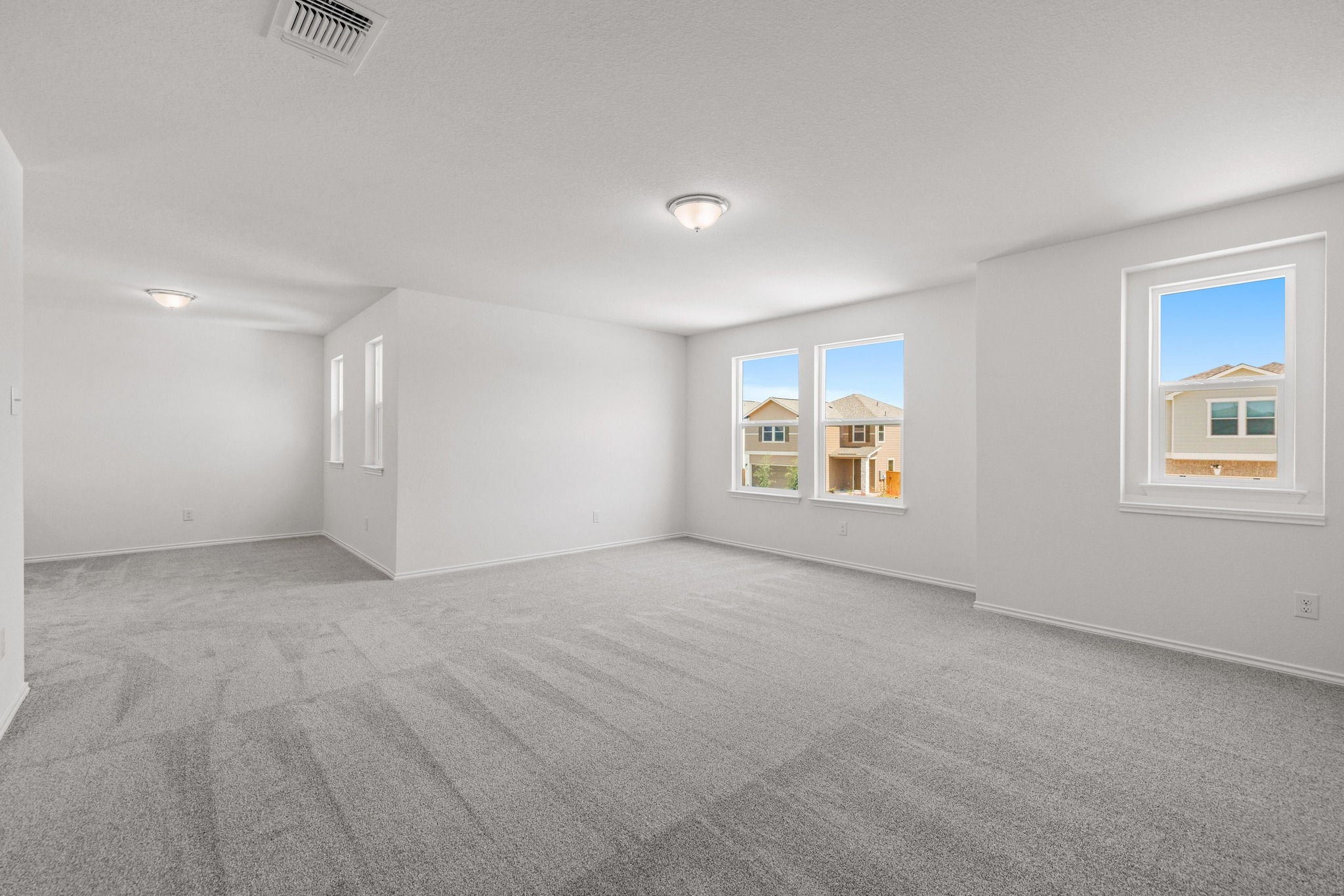 260 Feathers Street Jarrell, TX 76537 - Photo 21 of 34 a view of an empty room with a window