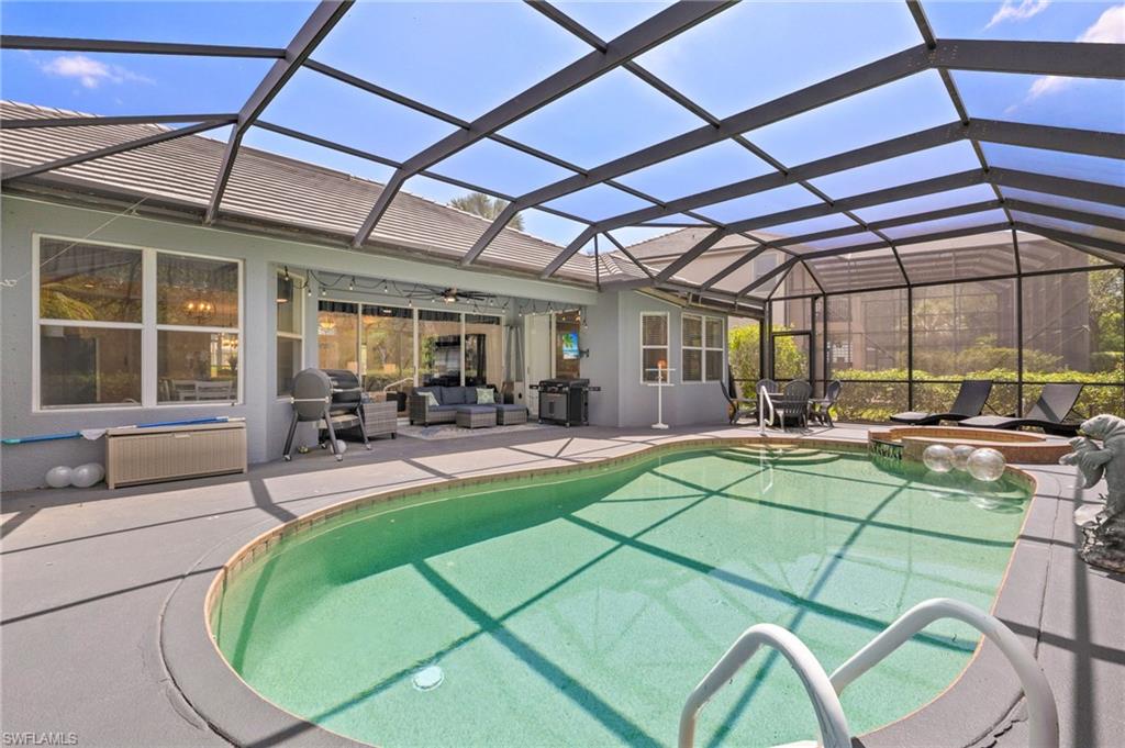 9890 Rookery Circle Estero, FL 33928 - Photo 3 of 26 a room with lots of tables and chairs