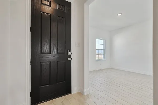 wooden floor and windows in a room
